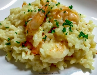 <p>Plate risotto & sprinkle fresh chopped parsley on top. Dinner is served!</p>
